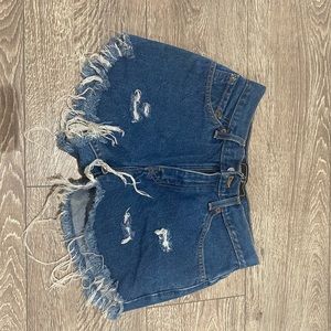 Levi’s high waisted distressed denim shorts